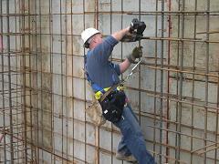 Construction site where reinforced steel is fixed with an automatic rebar tier